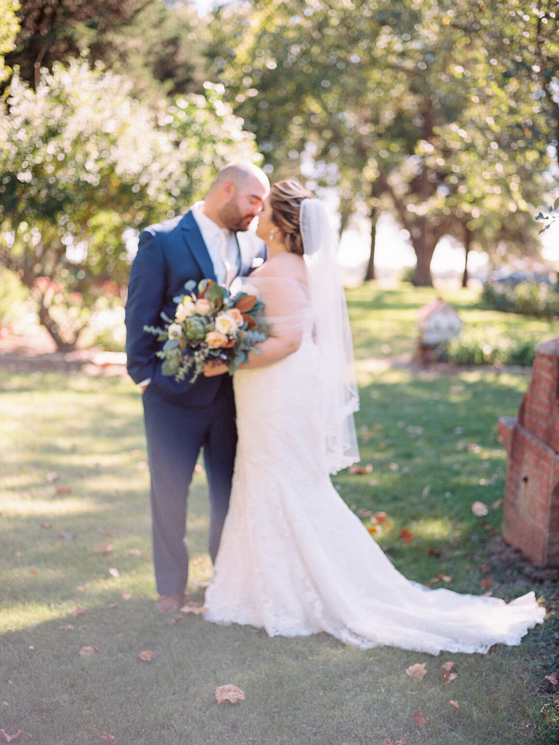 Bride and groom portrait at a family farm wedding in Morton, IL by Pam Cooley