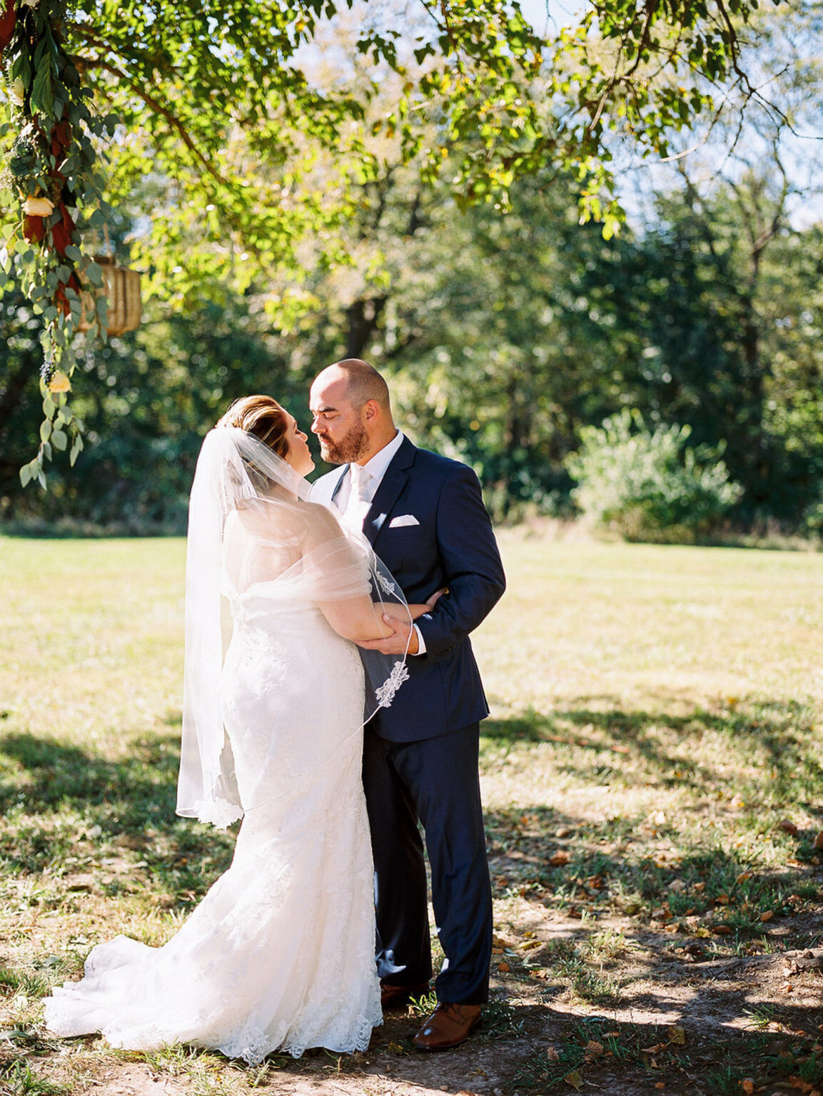 Bride and groom portrait at a family farm wedding in Morton, IL by Pam Cooley Photography